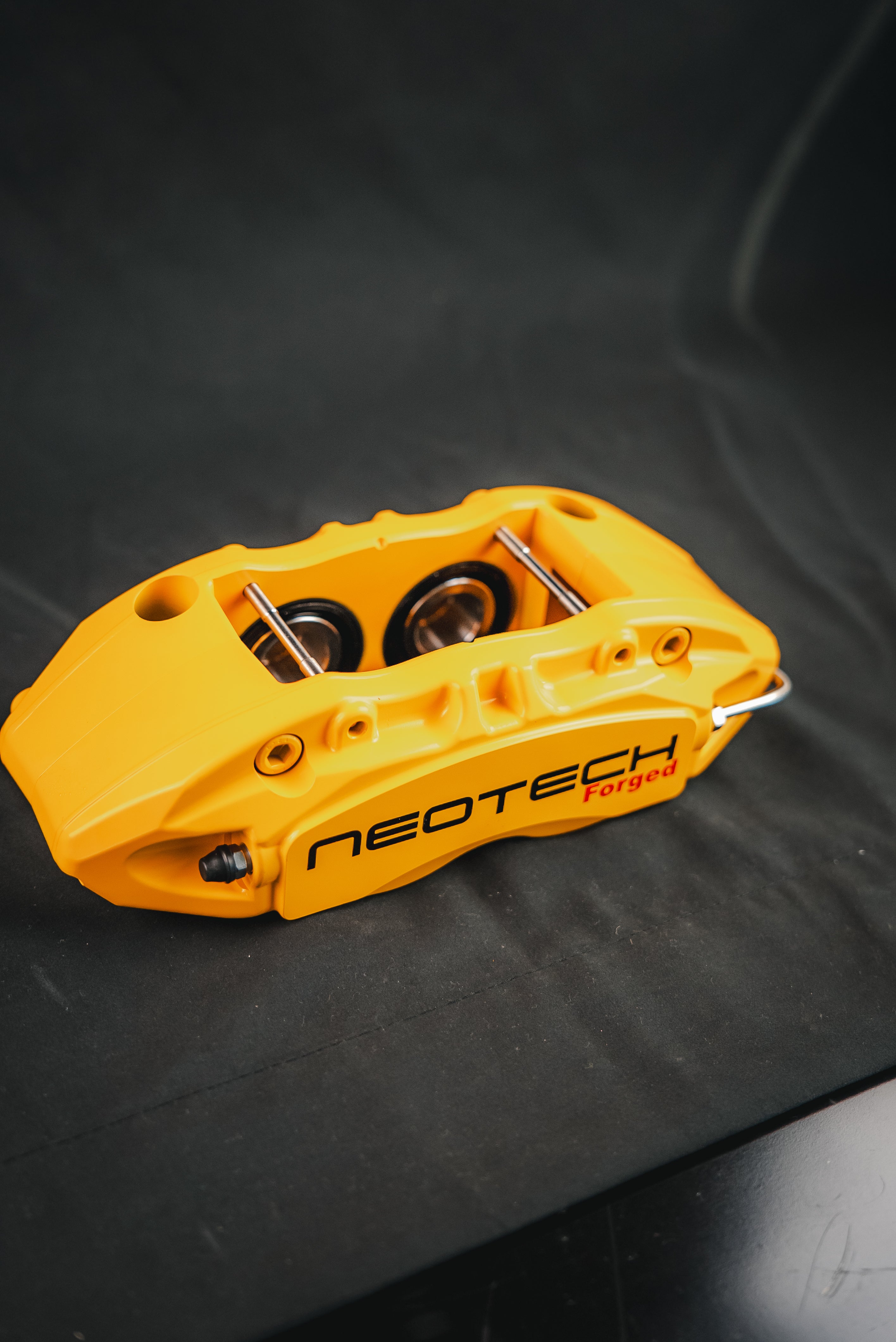 Neotech 4P rear brake caliper top down view